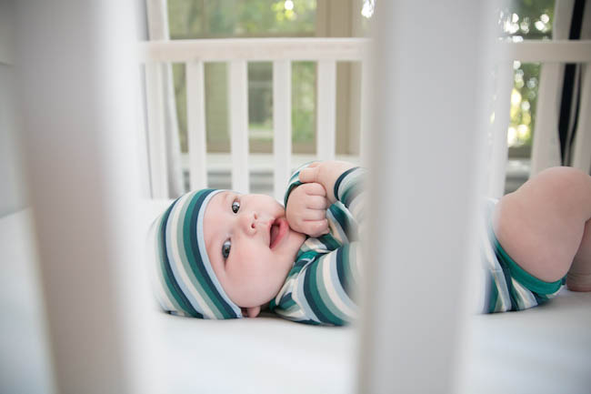 Happy Baby in Crib